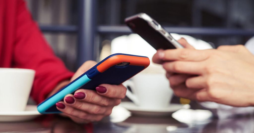 volunteers using phones